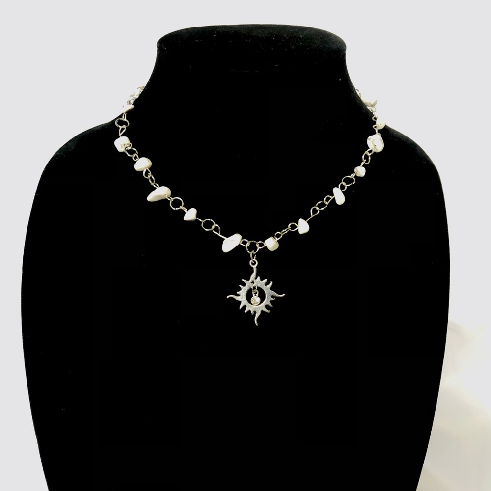 Gem and charm necklace